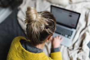 woman-in-yellow-sweater-using-macbook-pro MAA Online Advanced Mediation and CPS Mediation Training Classes